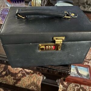 Sleek Black Leather jewelry box with Gold Accents